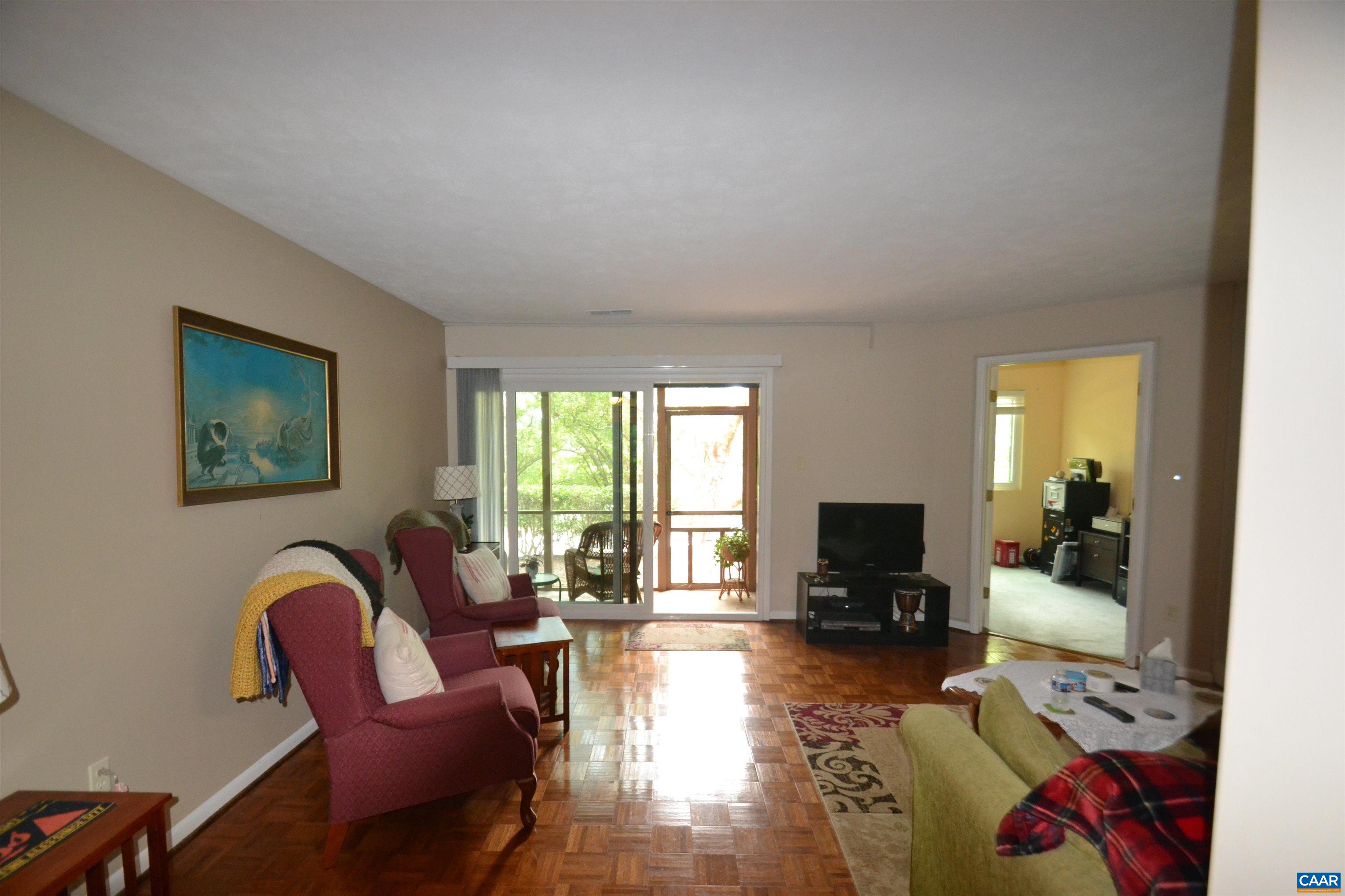 116 Turtle Creek Road, Unit 2 Charlottesville, VA 22901 - Photo 13 of 39 a living room with furniture and wooden floor
