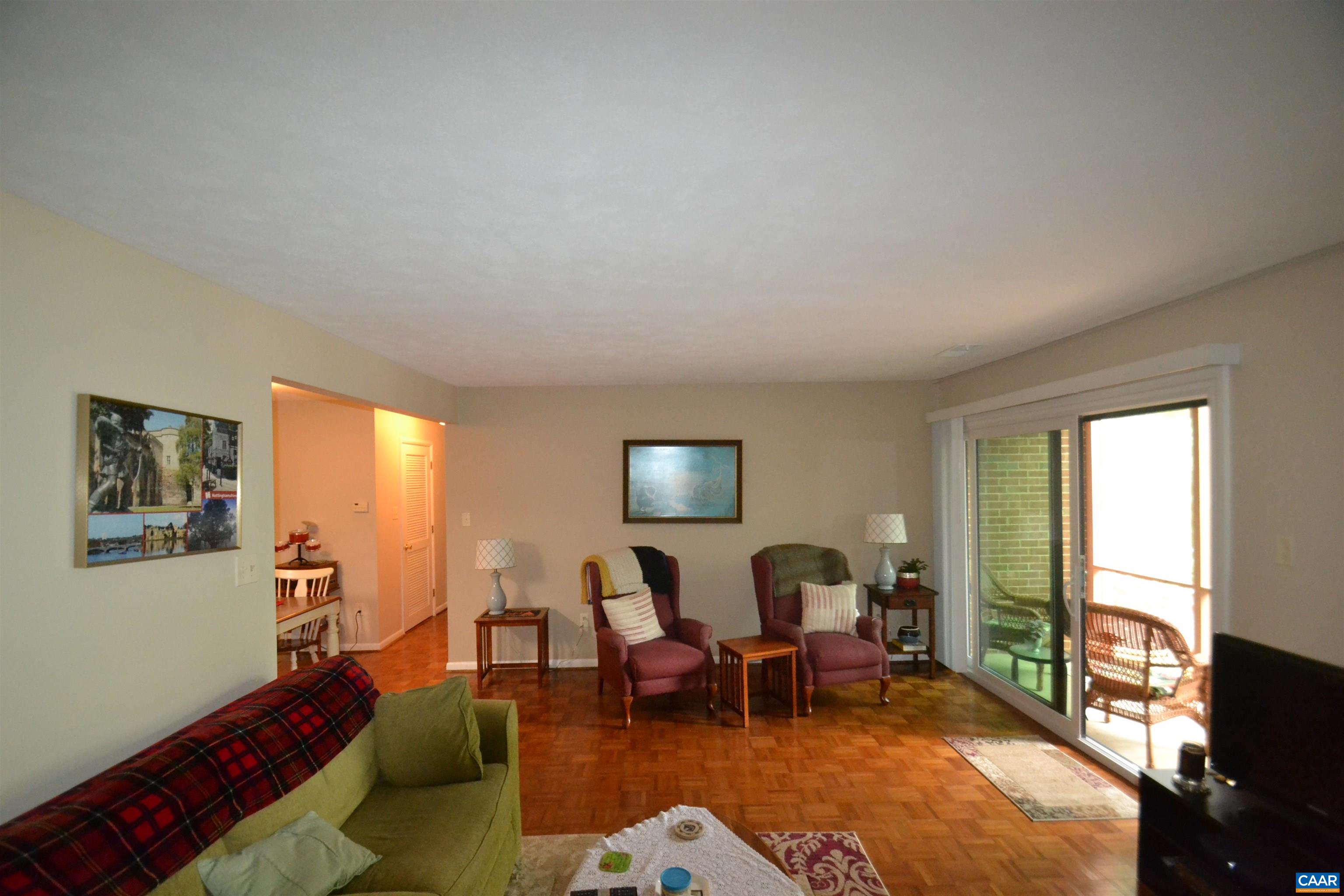 116 Turtle Creek Road, Unit 2 Charlottesville, VA 22901 - Photo 19 of 39 a living room with furniture and a flat screen tv