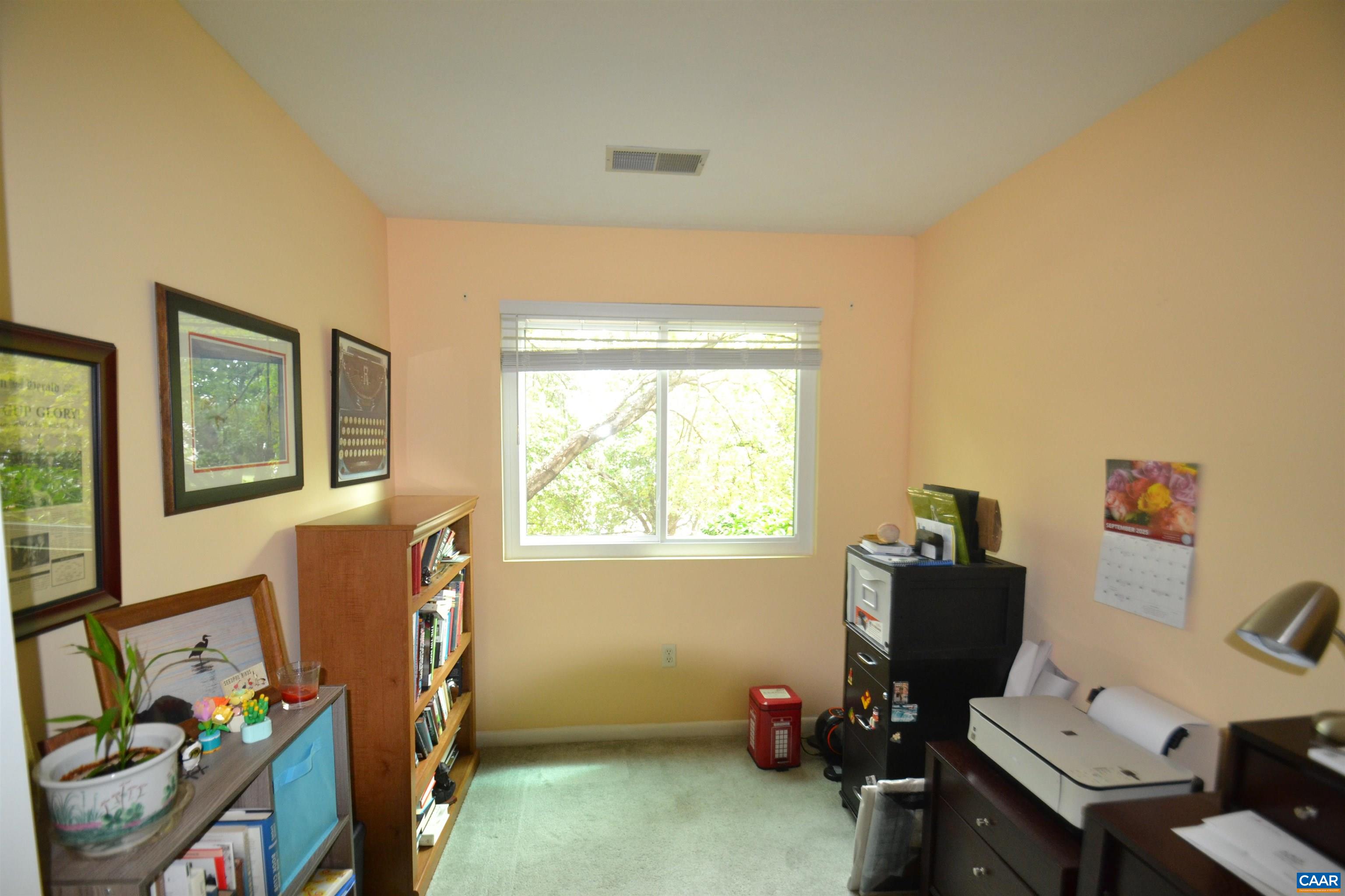116 Turtle Creek Road, Unit 2 Charlottesville, VA 22901 - Photo 22 of 39 a room with furniture and a window