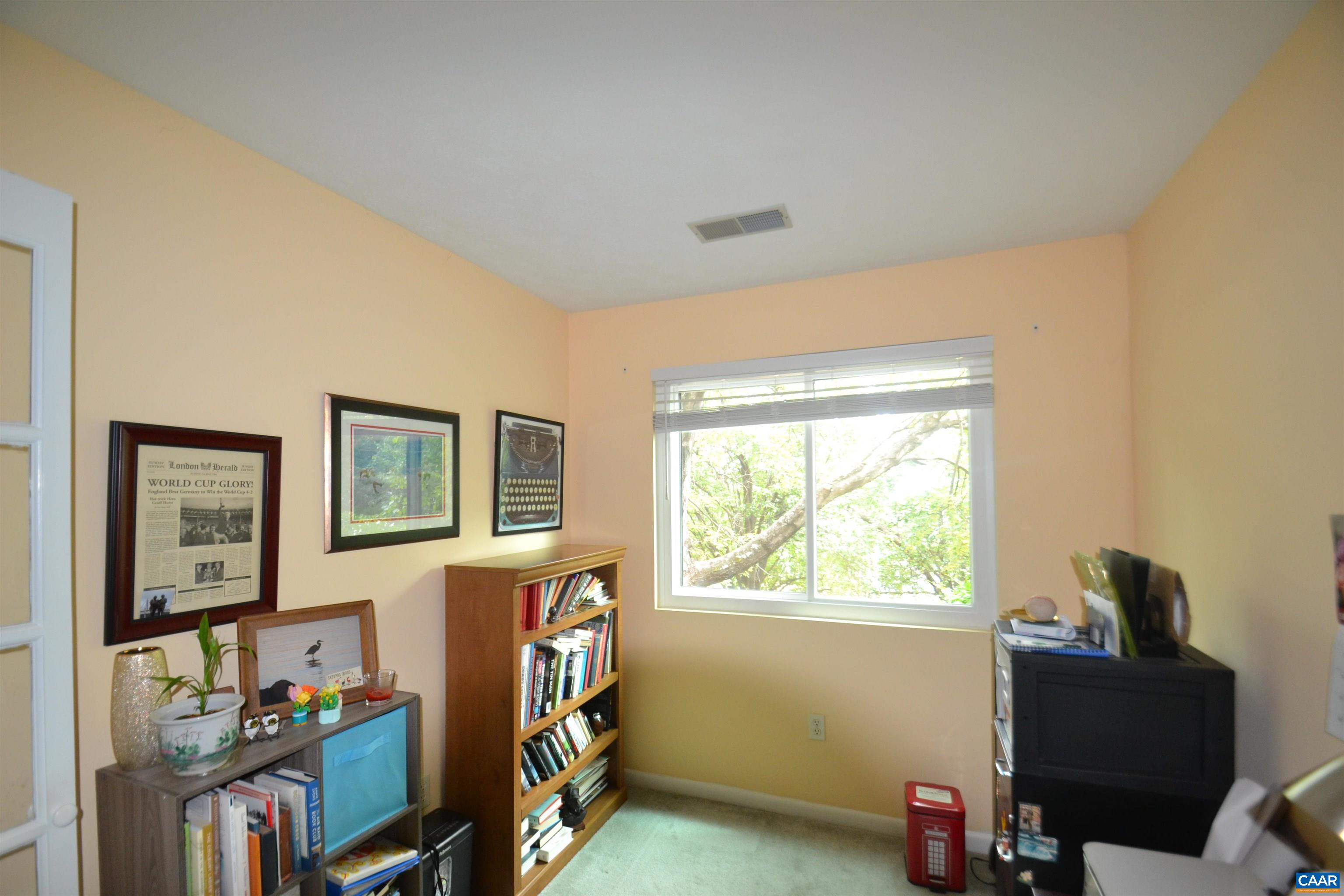 116 Turtle Creek Road, Unit 2 Charlottesville, VA 22901 - Photo 24 of 39 a view of a workspace with furniture and a window