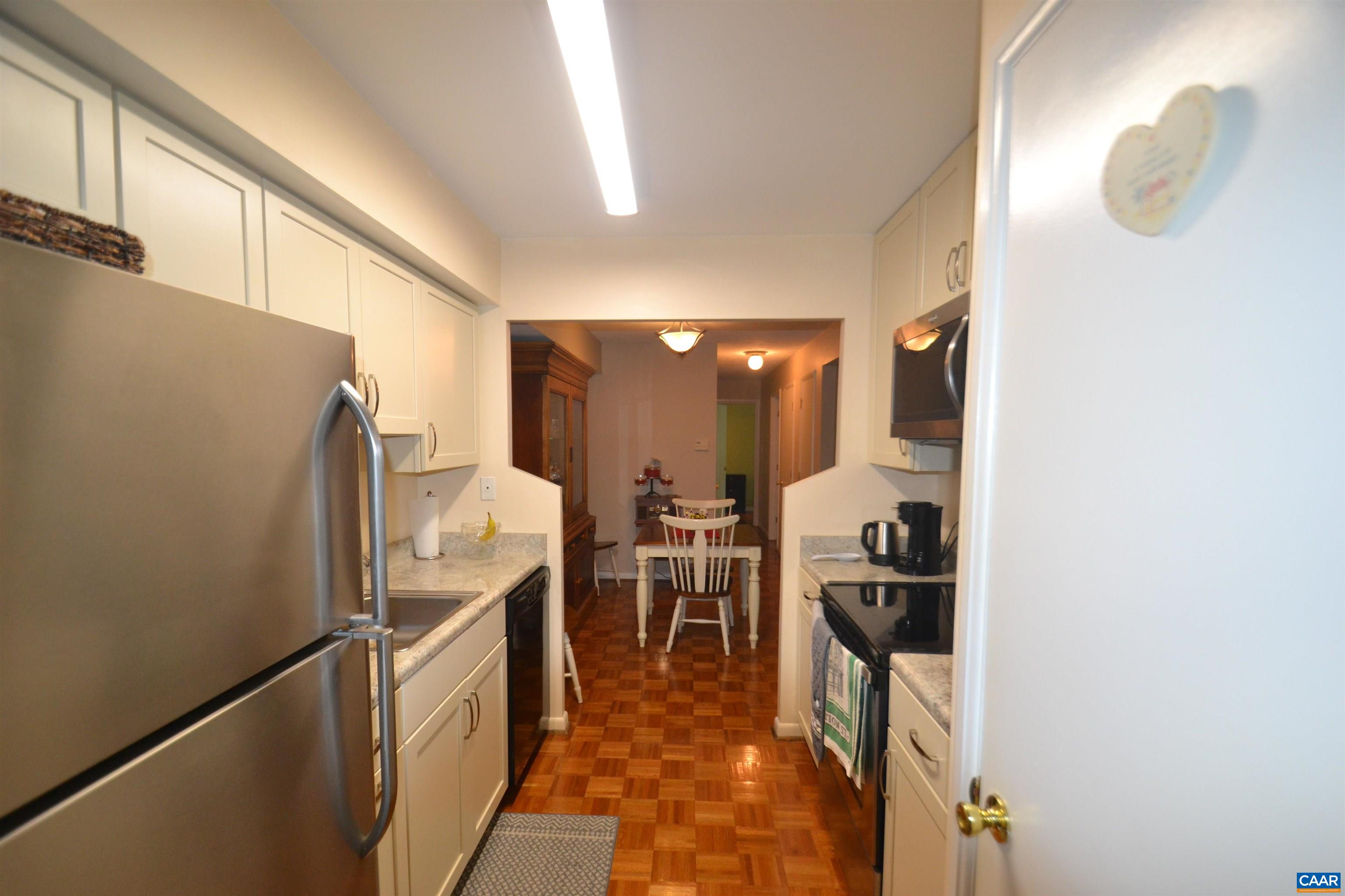 116 Turtle Creek Road, Unit 2 Charlottesville, VA 22901 - Photo 5 of 39 a kitchen with refrigerator and window