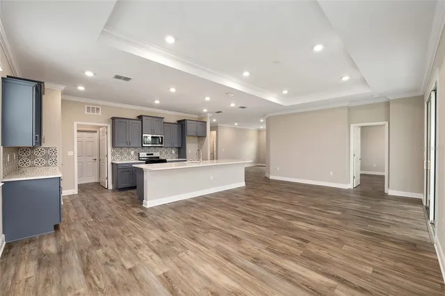 a view of a kitchen and a sink