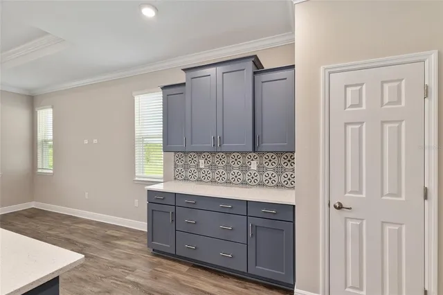 a en suite bathroom with a sink and a mirror