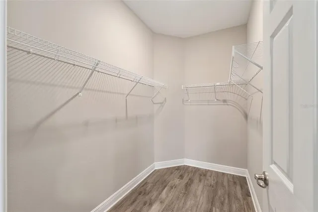 a view of a livingroom with wooden floor