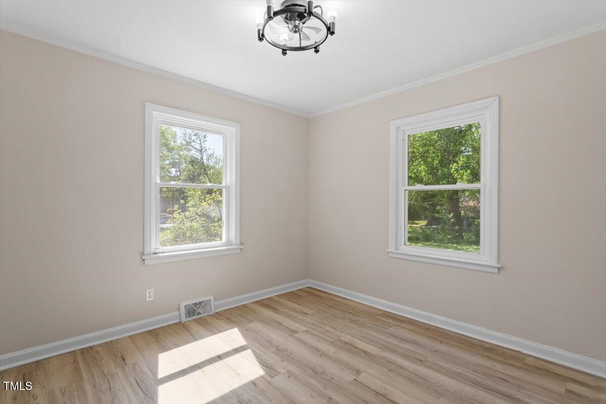 2304 Nelson Street Raleigh, NC 27610 - Photo 21 of 23 an empty room with a window
