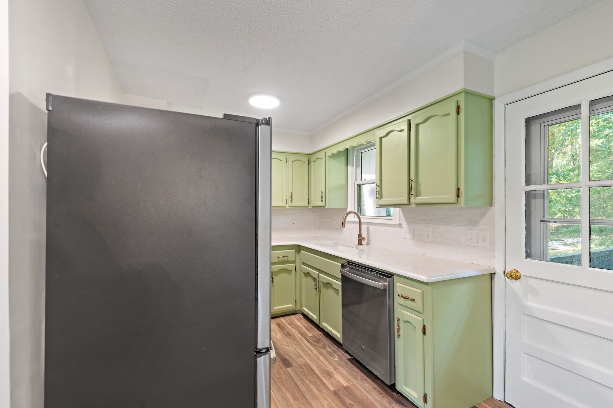 1627 West Grab Creek Road Dickson, TN 37055 - Photo 11 of 46 a kitchen with a sink and a window