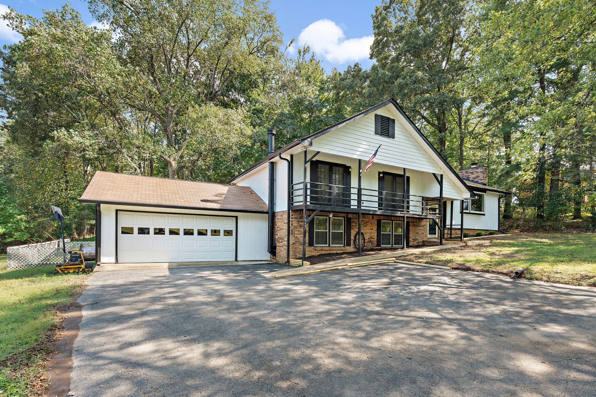 1627 West Grab Creek Road Dickson, TN 37055 - Photo 2 of 46 a front view of a house with a yard