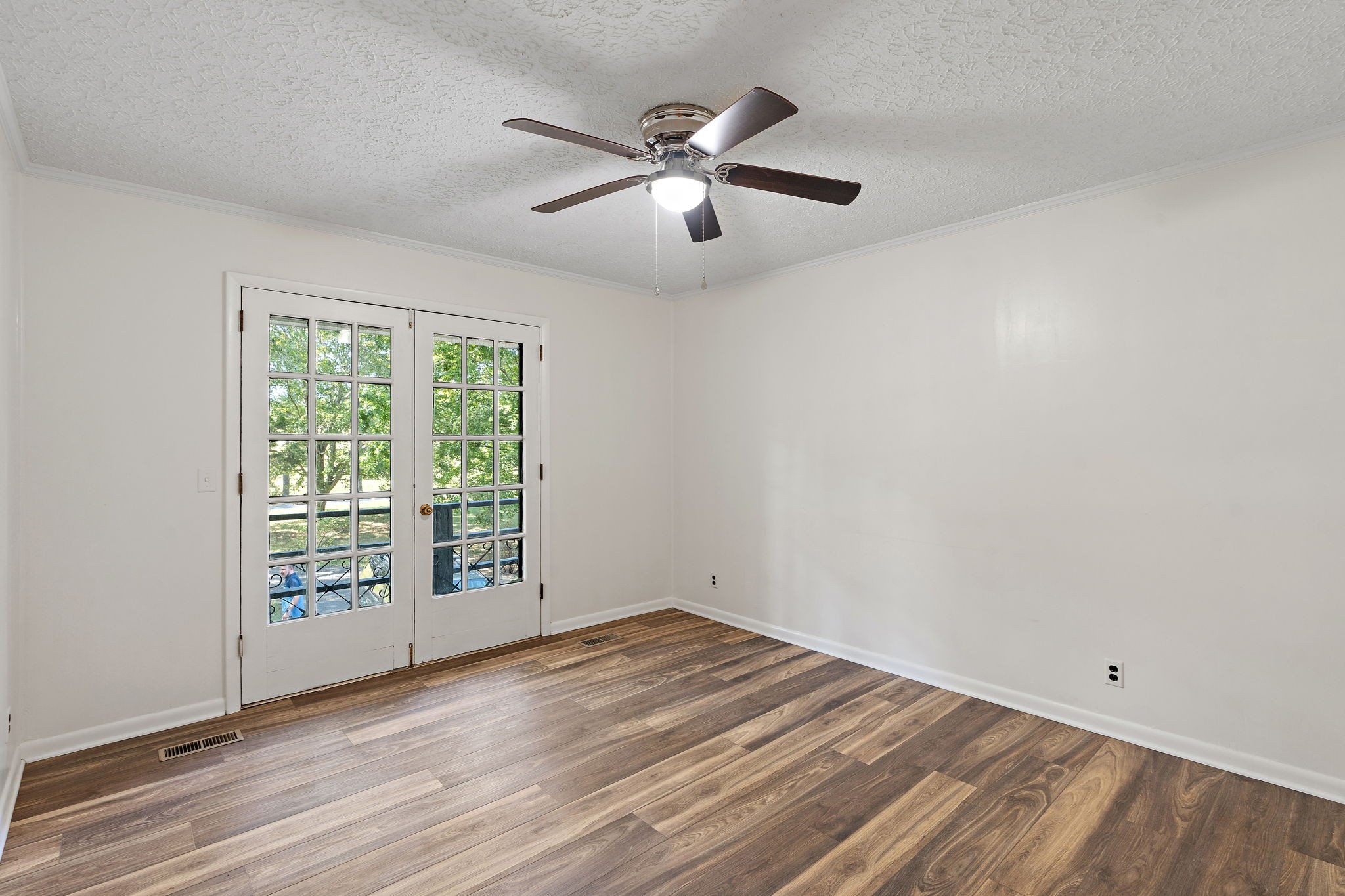 1627 West Grab Creek Road Dickson, TN 37055 - Photo 22 of 46 wooden floor in an empty room with a window