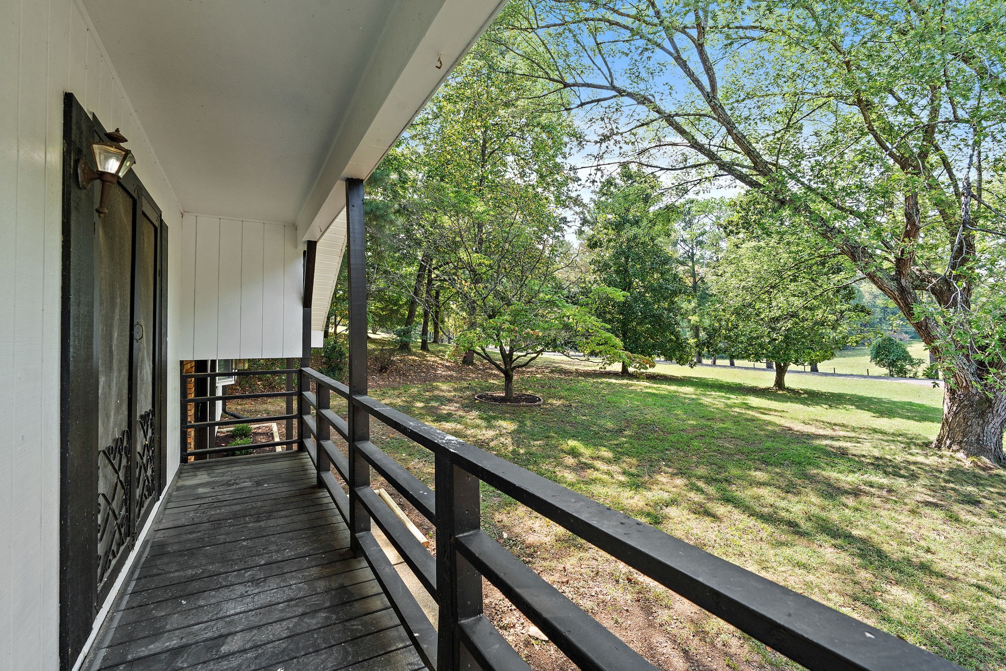 1627 West Grab Creek Road Dickson, TN 37055 - Photo 25 of 46 a view of a garden from a balcony