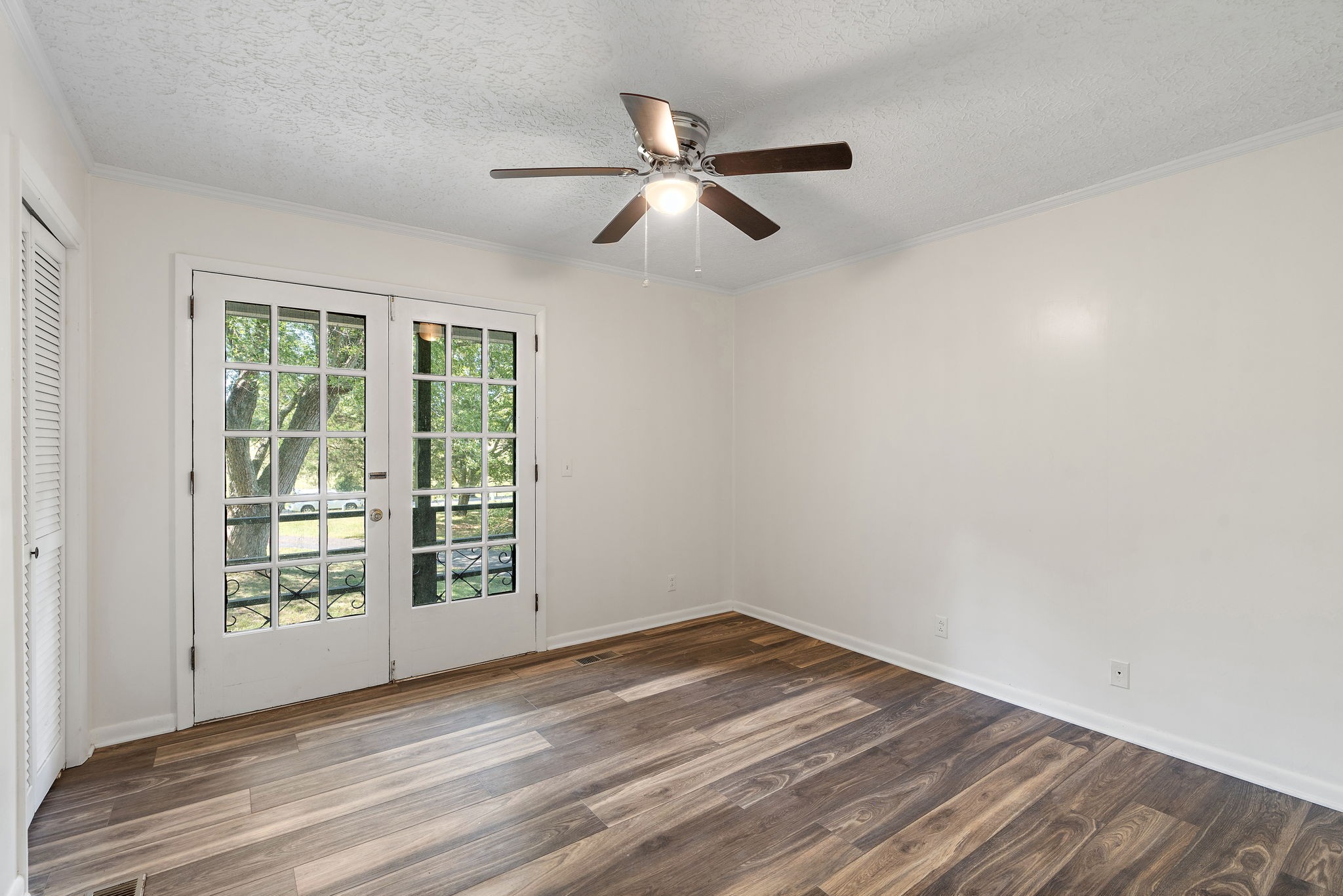 1627 West Grab Creek Road Dickson, TN 37055 - Photo 26 of 46 wooden floor in an empty room with a window
