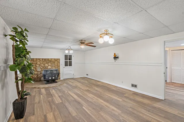 a view of livingroom with furniture and wooden floor