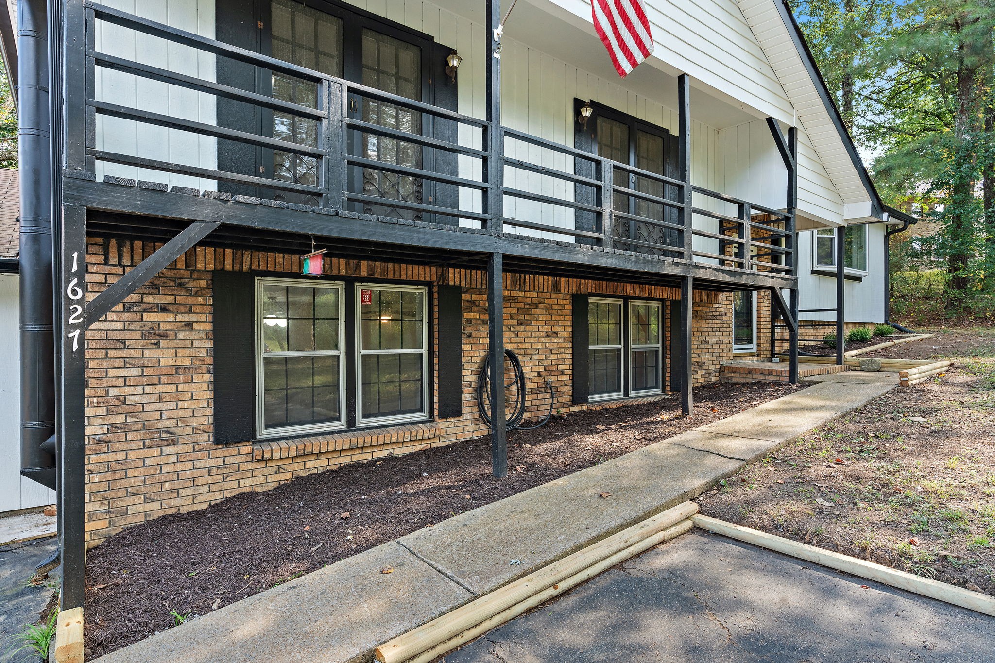 1627 West Grab Creek Road Dickson, TN 37055 - Photo 3 of 46 a front view of a building with large windows