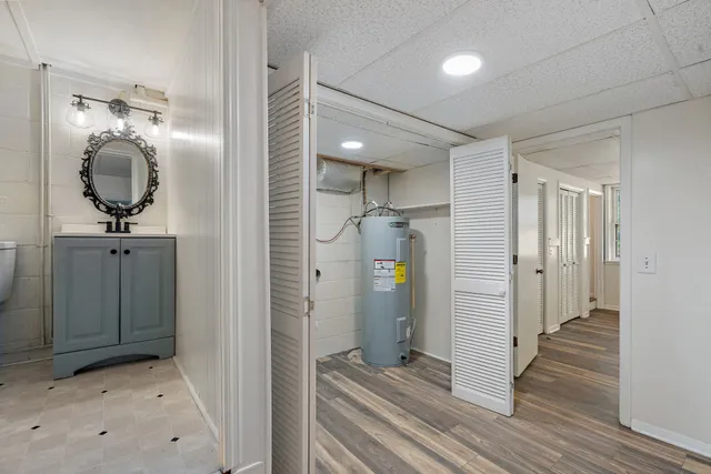 a view of a bathroom from a hallway