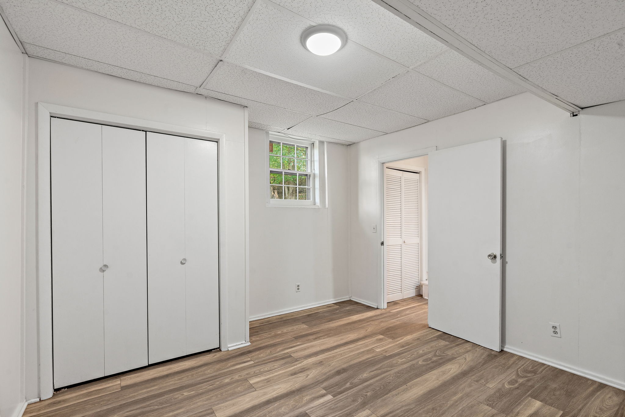 1627 West Grab Creek Road Dickson, TN 37055 - Photo 36 of 46 a view of an empty room with wooden floor
