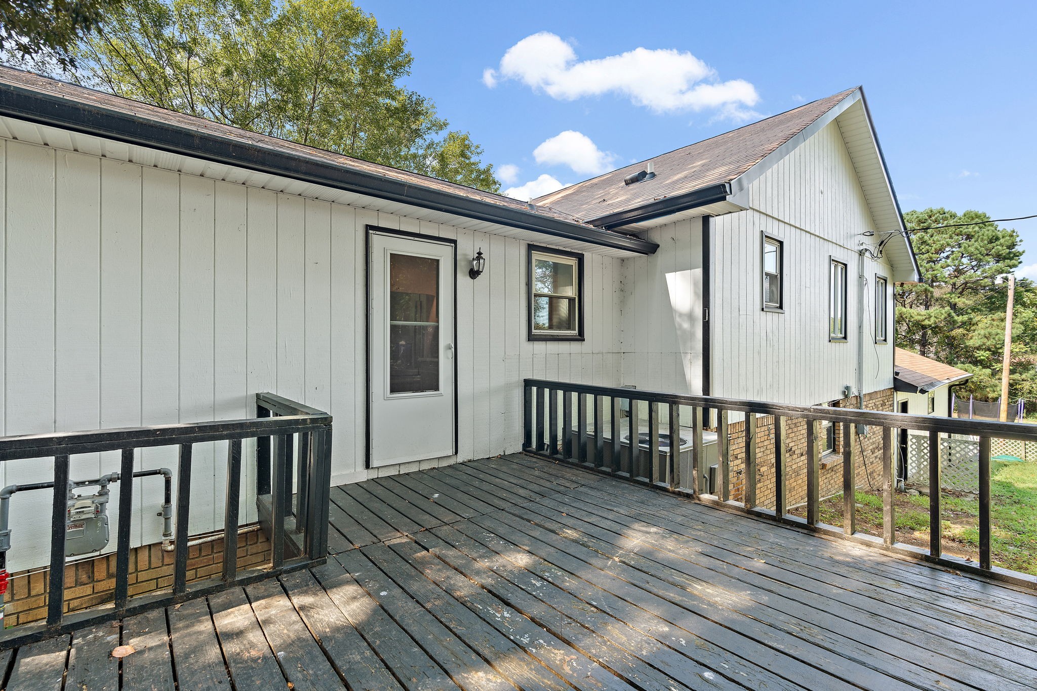 1627 West Grab Creek Road Dickson, TN 37055 - Photo 37 of 46 a view of a house with a wooden deck