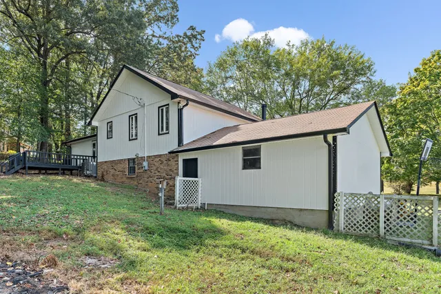a view of a back yard of the house
