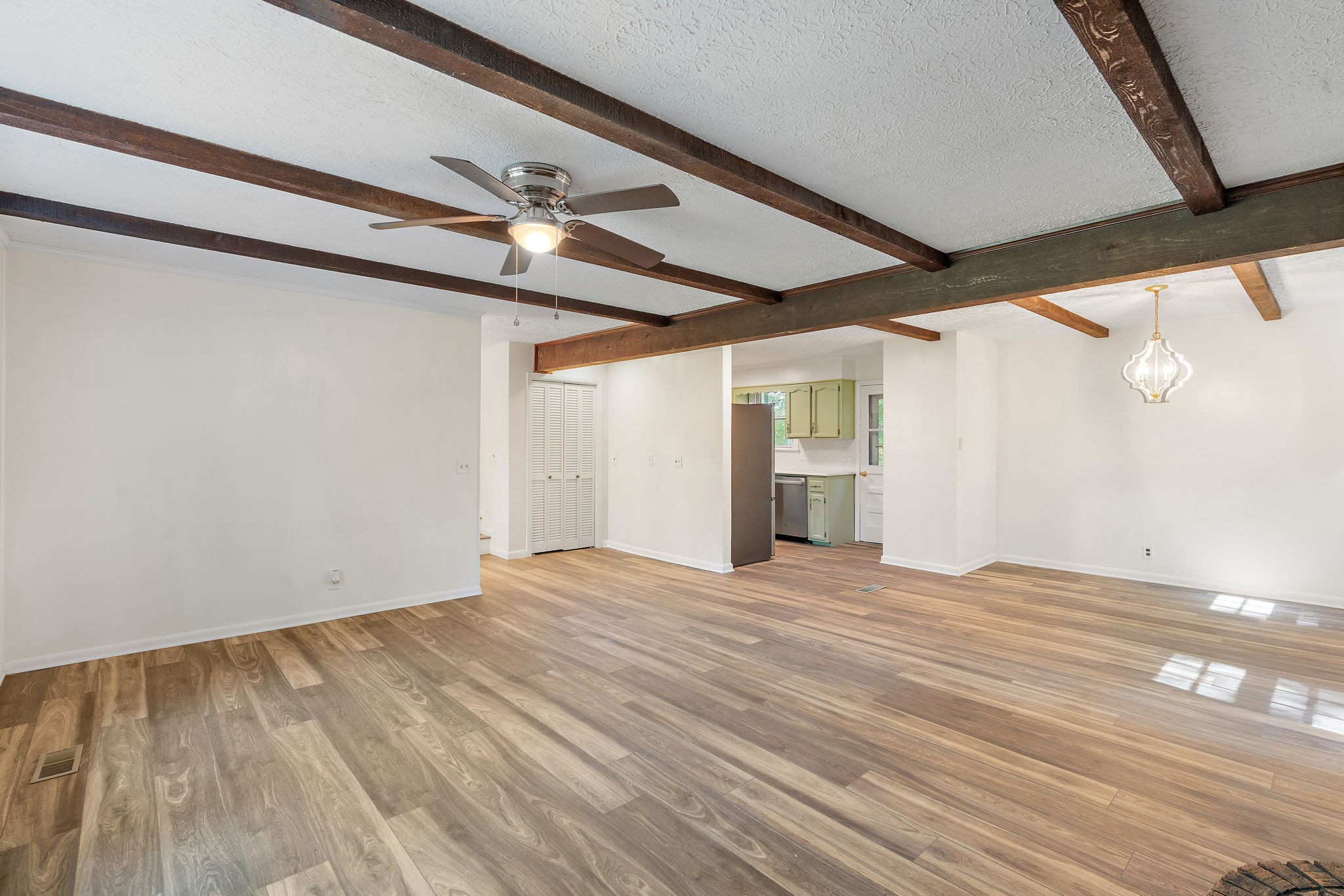 1627 West Grab Creek Road Dickson, TN 37055 - Photo 9 of 46 a view of empty room with wooden floor and fan