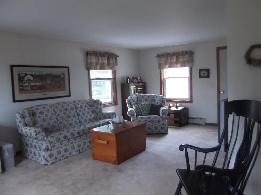 140 Ames Road Dover-Foxcroft, ME 04426 - Photo 15 of 30 Formal living room with door to back...