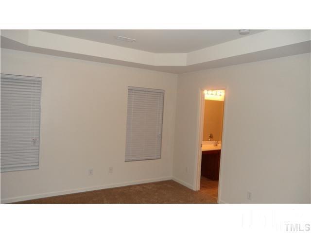 6610 Frogstool Lane Raleigh, NC 27610 - Photo 6 of 11 a black and white photo of a room