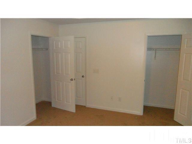 6610 Frogstool Lane Raleigh, NC 27610 - Photo 10 of 11 a open hall with a bench in it