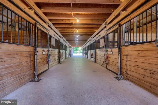 a view of an empty room with stairs