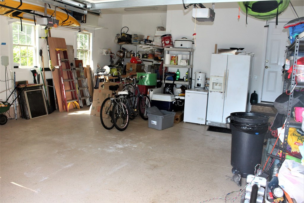 105 Hickory Point McCormick, SC 29835 - Photo 54 of 56 Garage with work bench in corner