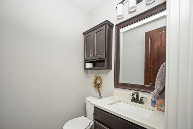 a utility room with sink dryer and washer