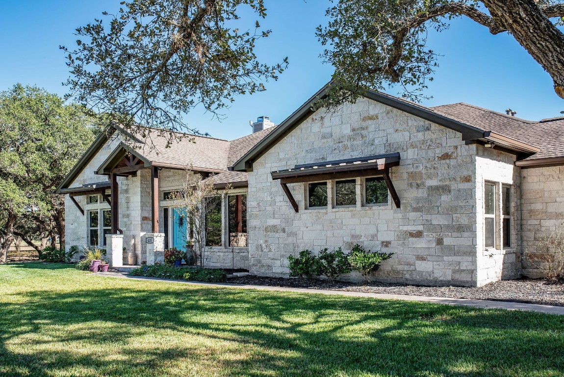 437 Bischoff Road Inez, TX 77968 - Photo 2 of 45 a front view of a house with a yard and garage