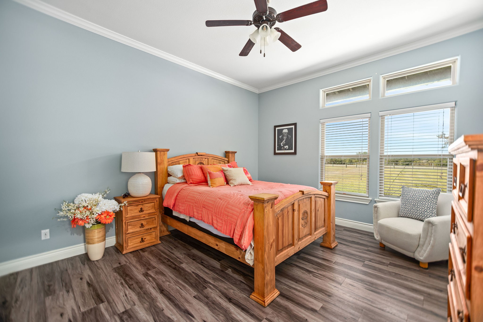 437 Bischoff Road Inez, TX 77968 - Photo 22 of 45 a bedroom with a bed and wooden floor