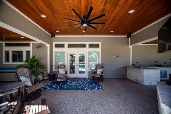 a living room with patio furniture