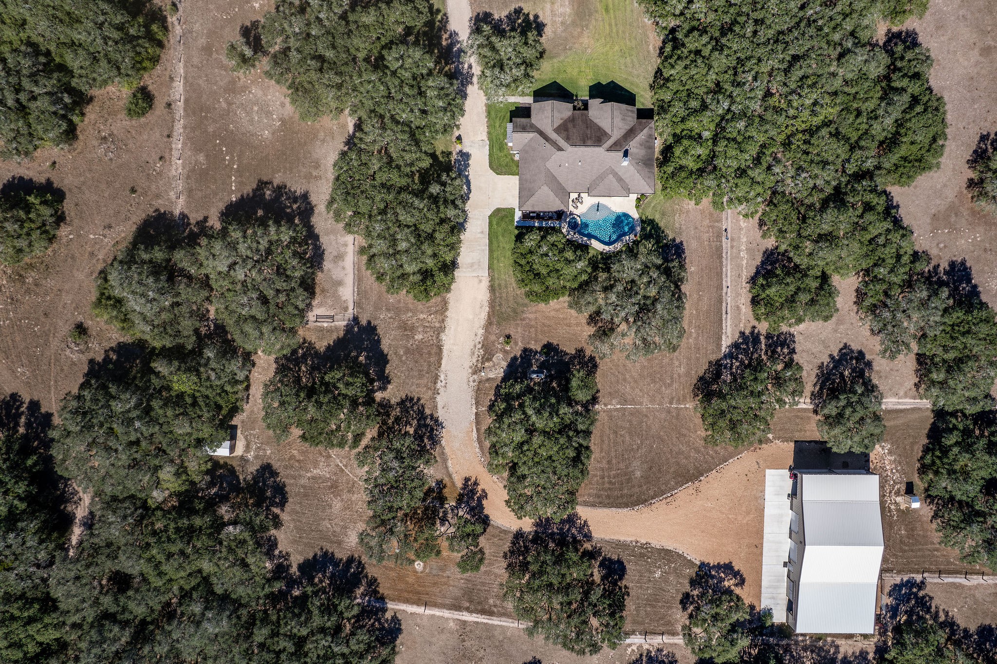 437 Bischoff Road Inez, TX 77968 - Photo 42 of 45 an aerial view of a house with a yard and trees