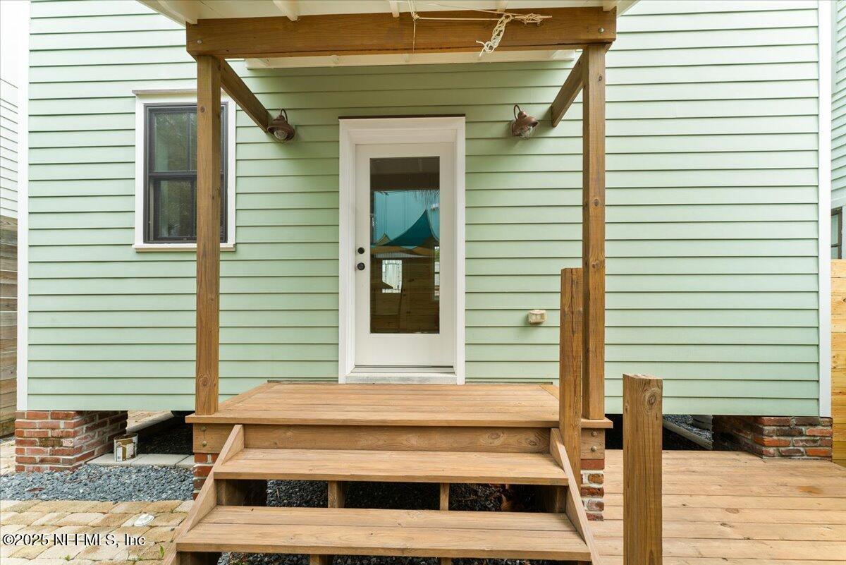 121 Moore Street St. Augustine, FL 32084 - Photo 24 of 31 02-Back porch door 5-9-2025