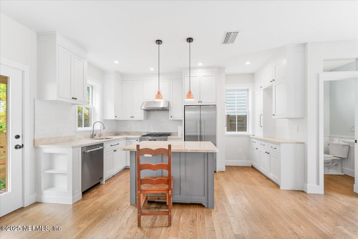 121 Moore Street St. Augustine, FL 32084 - Photo 7 of 31 10-Facing Kitchen 1 5-9-2025