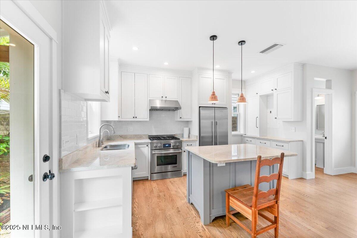 121 Moore Street St. Augustine, FL 32084 - Photo 9 of 31 13-Facing Kitchen 2 5-9-2025