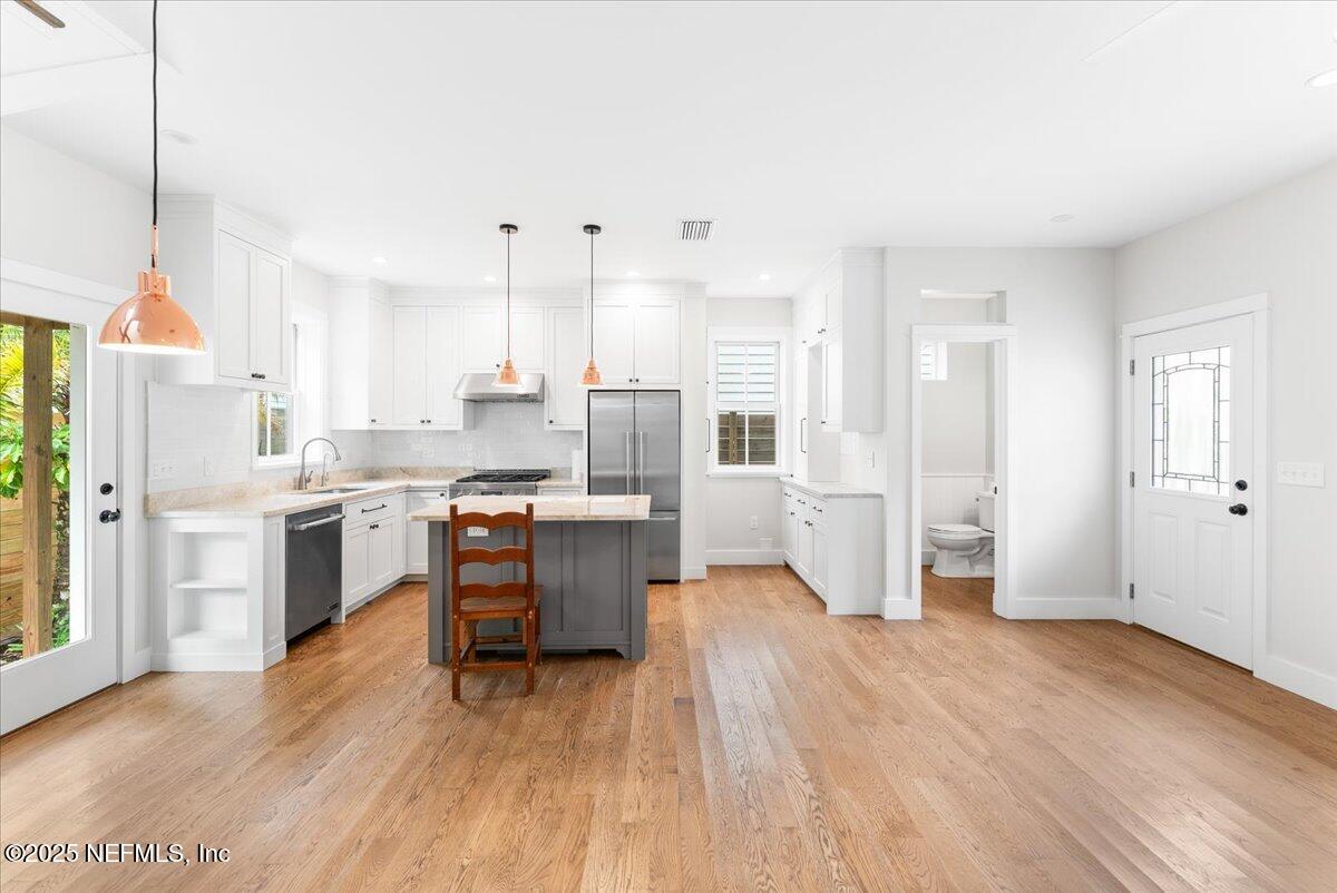 121 Moore Street St. Augustine, FL 32084 - Photo 10 of 31 14-Facing kitchen + BR 5-9-2025