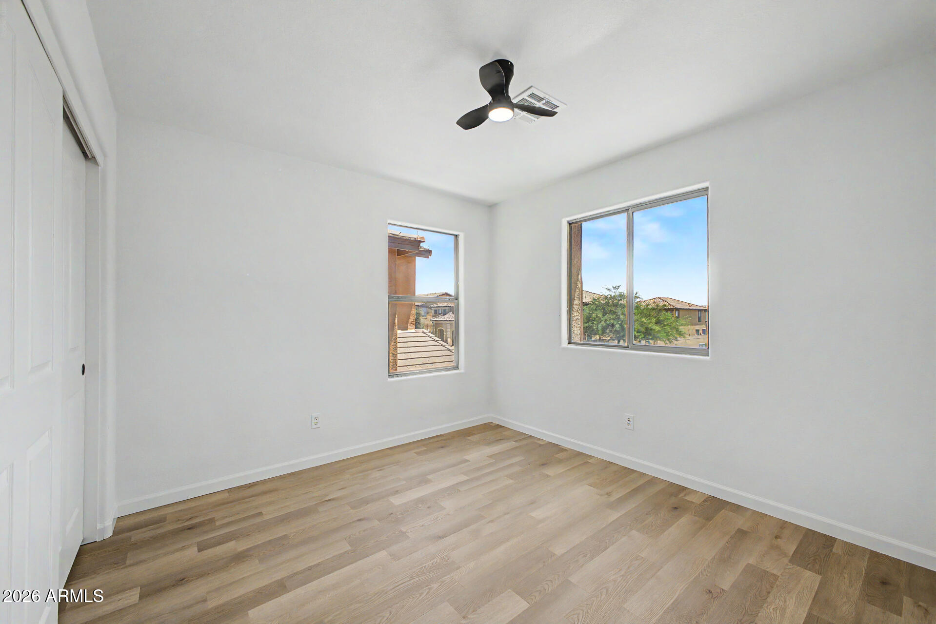 6452 West Ruth Avenue Glendale, AZ 85302 - Photo 30 of 35 a view of empty room with ceiling fan