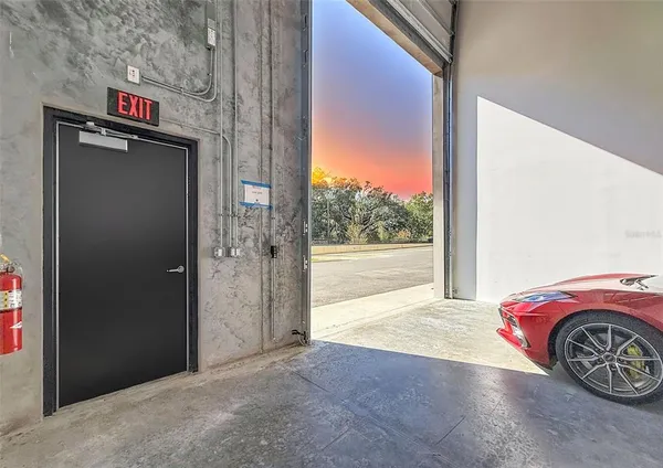a view of a room with a bed
