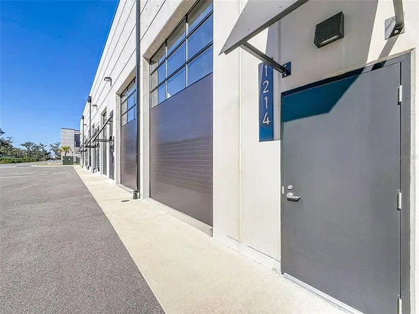 a view of a building from a door