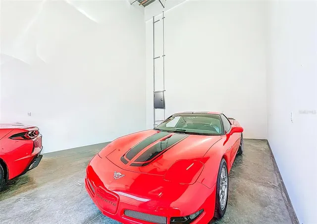 a swimming pool with outdoor seating and yard