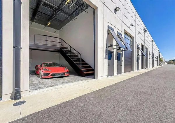 a view of a two chairs in the side of building