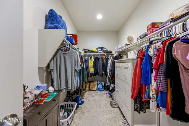 a en suite bathroom with a sink and a mirror
