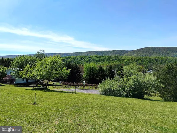 a view of outdoor space with mountain view