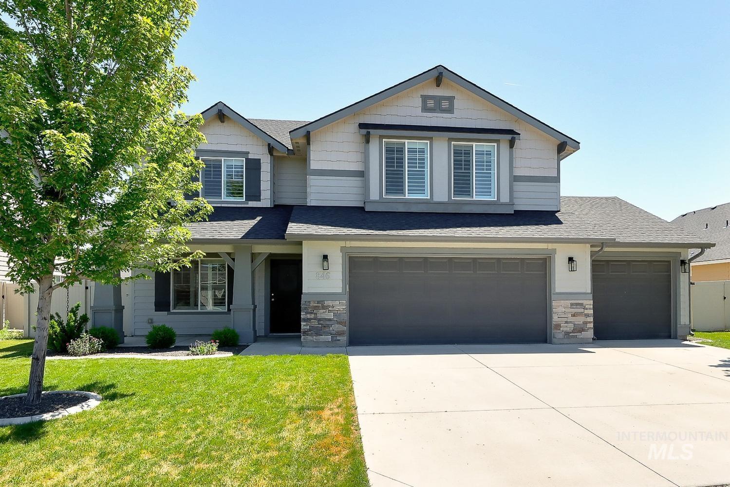 846 North Hidden View Way Star, ID 83669 - Photo 2 of 49 Two-story residence featuring a gabled roofline and stone accent facade