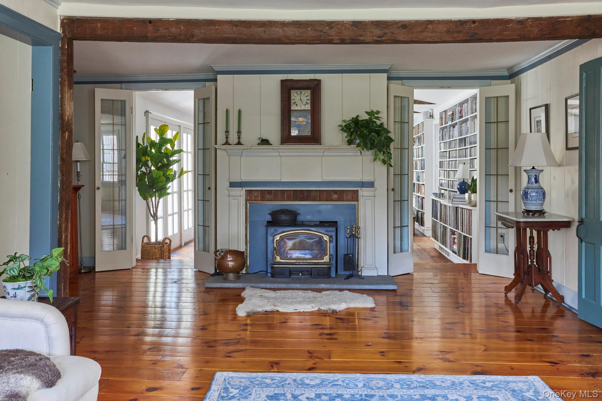 457 Round Lake Road Rhinebeck, NY 12572 - Photo 15 of 25 a living room with furniture and a fireplace