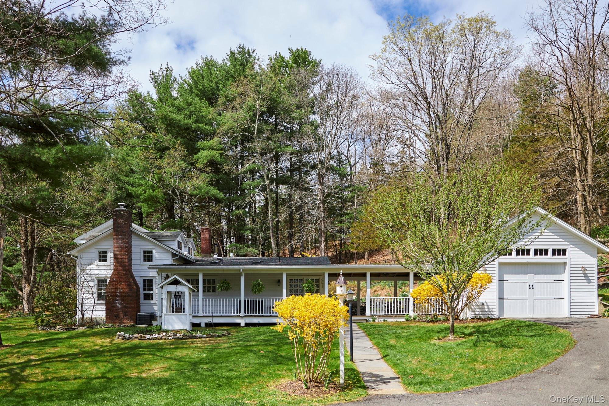 457 Round Lake Road Rhinebeck, NY 12572 - Photo 2 of 25 front view of house with a yard