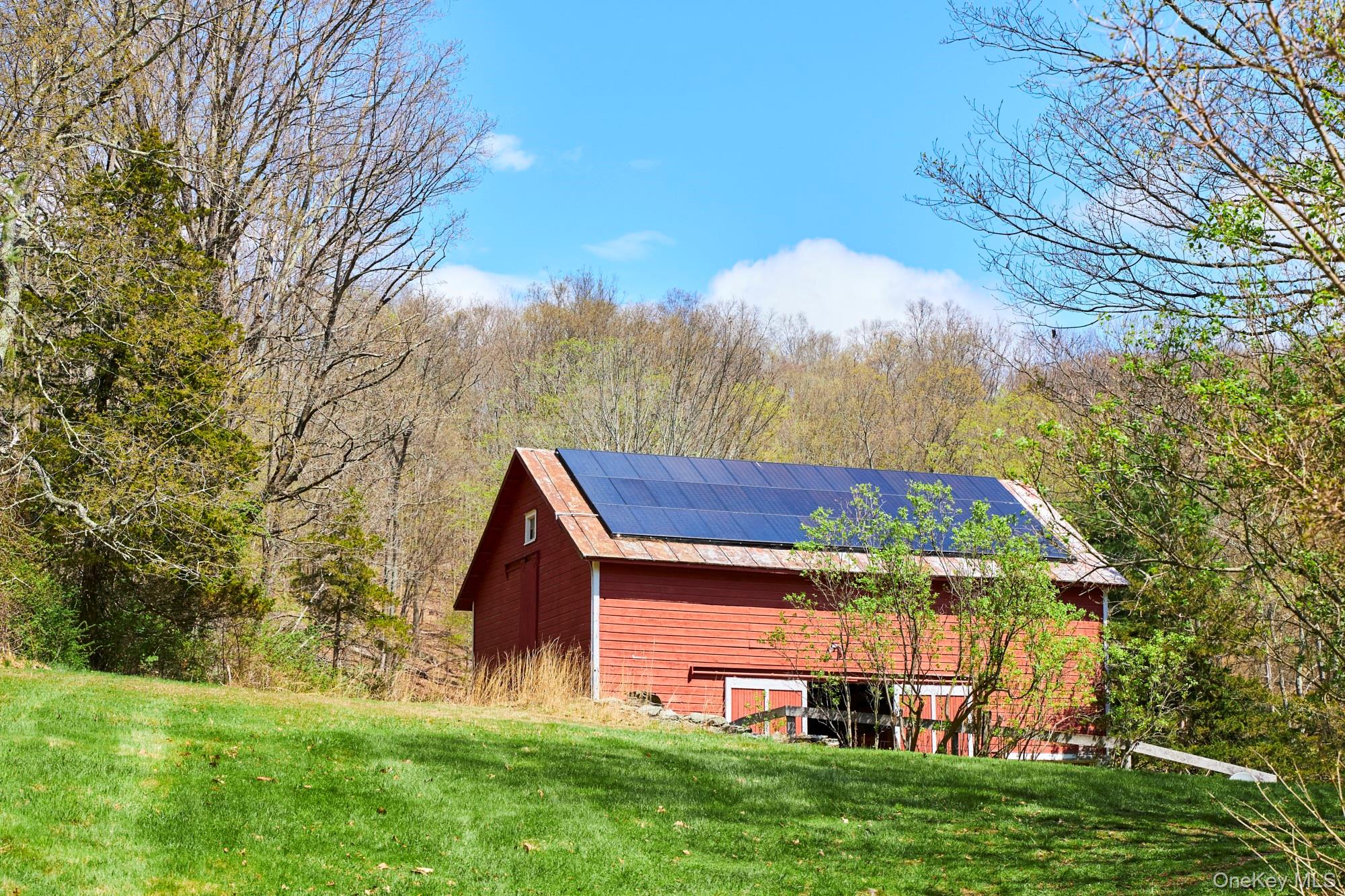 457 Round Lake Road Rhinebeck, NY 12572 - Photo 4 of 25 a view of a house with a yard