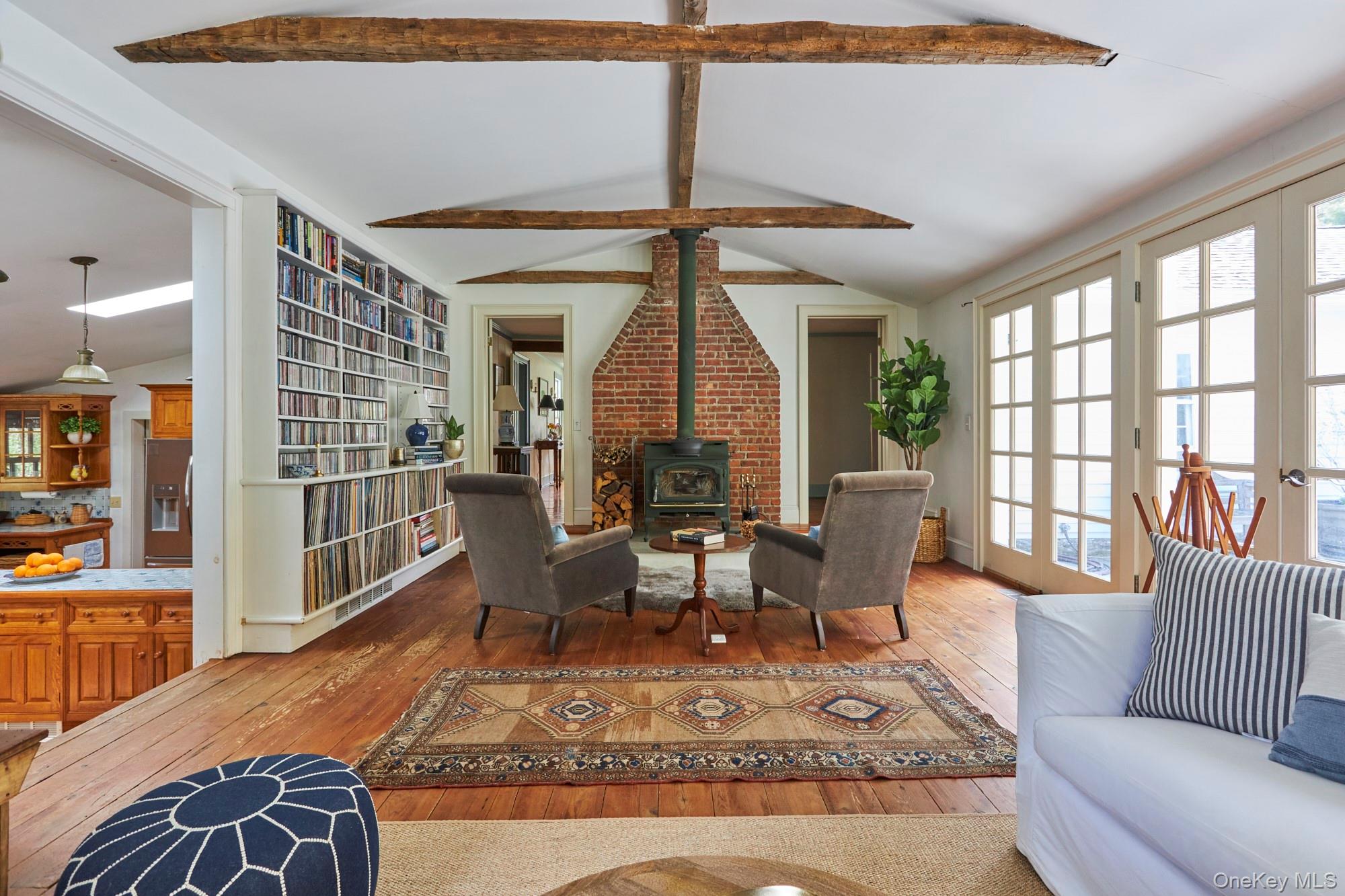 457 Round Lake Road Rhinebeck, NY 12572 - Photo 8 of 25 a living room with furniture and a large window