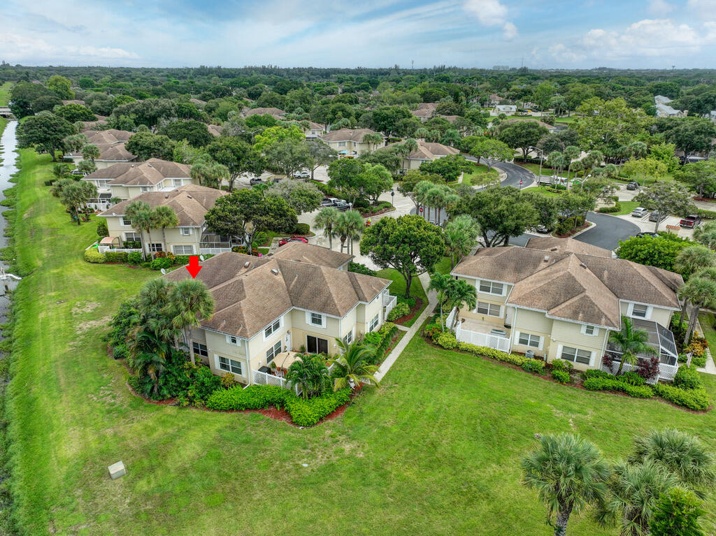 4102 Roxbury Court, Unit 41B Boynton Beach, FL 33436 - Photo 23 of 24 an aerial view of residential houses with outdoor space and trees