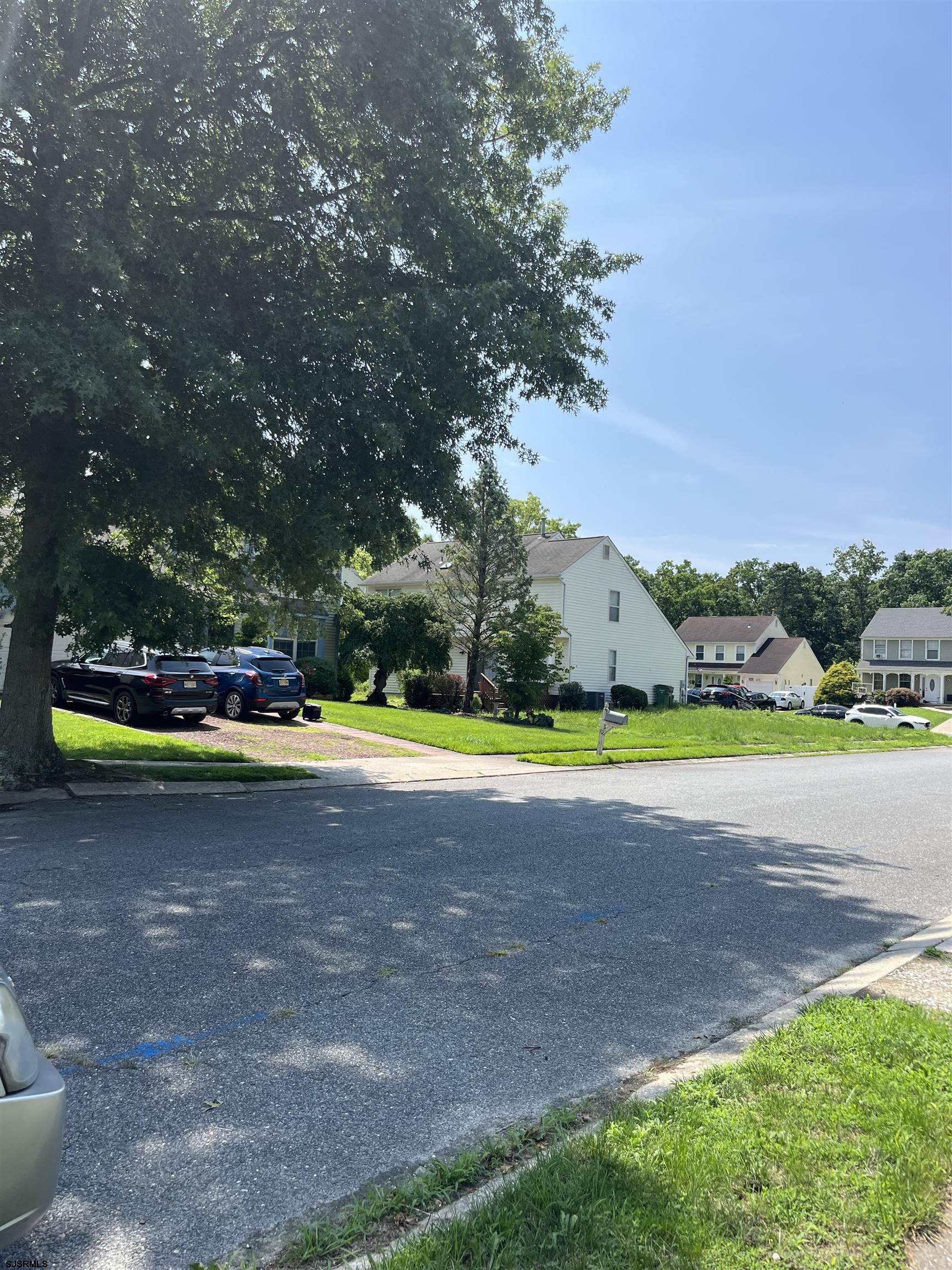 7 Compton Lane Egg Harbor Township, NJ 08234 - Photo 35 of 37 a view of yard with swimming pool and green space