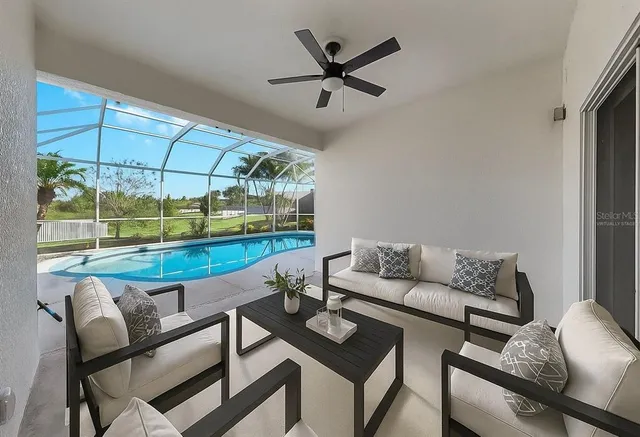a living room with furniture and a window